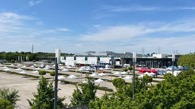 M-net Firmenlauf Augsburg Teamstand Meetingpoint Messe